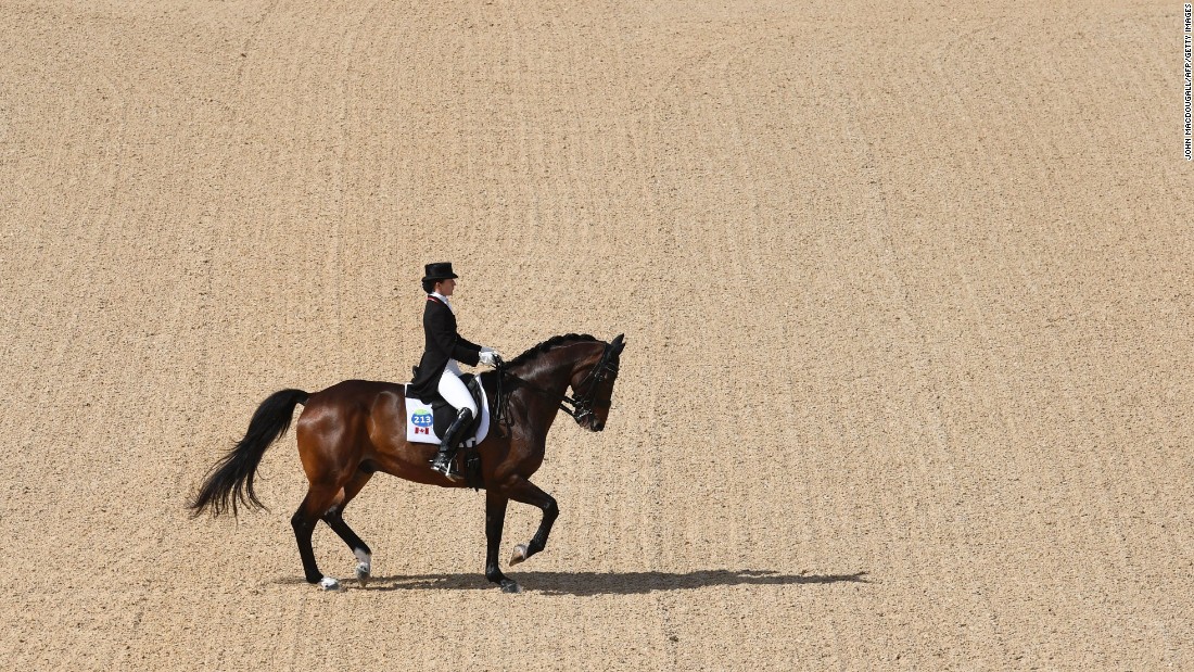 Canada&#39;s Belinda Trussell performs a routine during the dressage Grand Prix event.