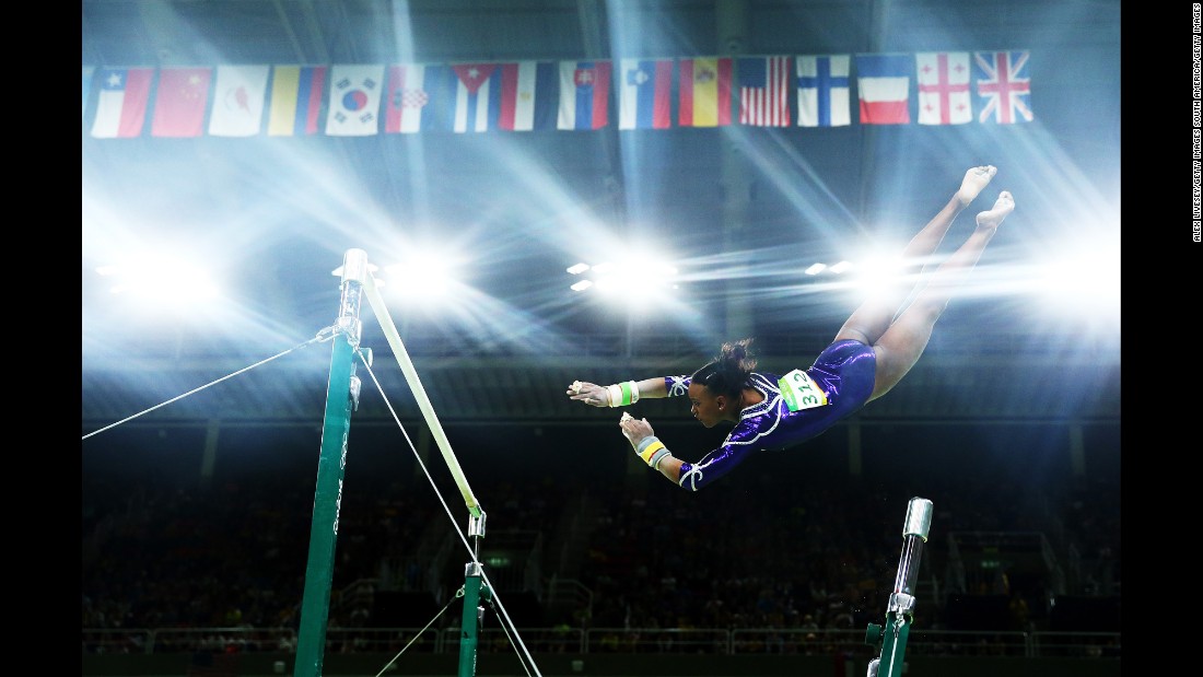 Brazilian gymnast Rebeca Andrade competes on the uneven bars during the individual all-around.
