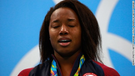 An emtional Simone Manuel on the medal podium 