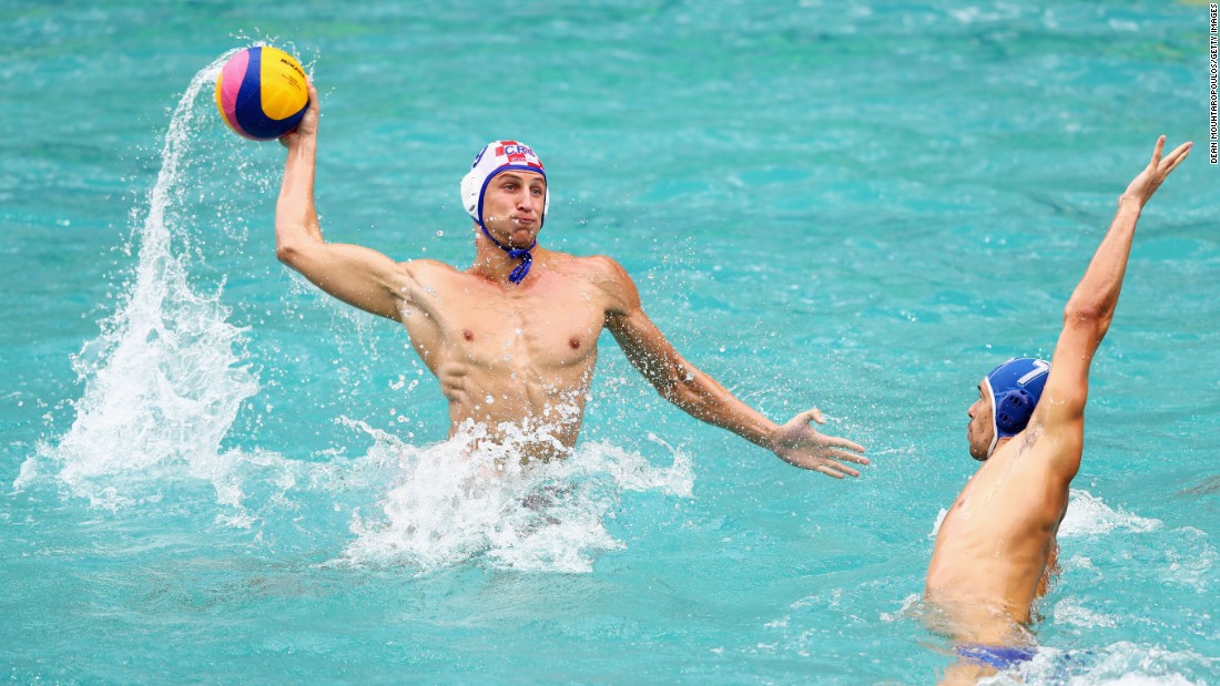 Croatia&#39;s Sandro Sukno shoots on goal during a water polo match against Italy. Croatia won 10-7.