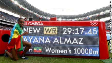 Ethiopia&#39;s Almaz Ayana celebrates winning the women&#39;s 10,000m final.