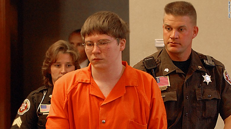 Brendan Dassey is escorted into court for his sentencing Thursday, Aug. 2, 2007, in Manitowoc, Wis. Dassey, a teenager convicted of helping his uncle rape and kill a woman, was sentenced to life in prison on Thursday with the possibility of parole in 41 years. (AP Photo/Eric Young, Pool)