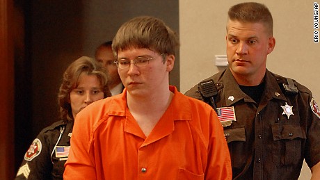 Brendan Dassey is escorted into court for his sentencing Thursday, Aug. 2, 2007, in Manitowoc, Wis. Dassey, a teenager convicted of helping his uncle rape and kill a woman, was sentenced to life in prison on Thursday with the possibility of parole in 41 years. (AP Photo/Eric Young, Pool)