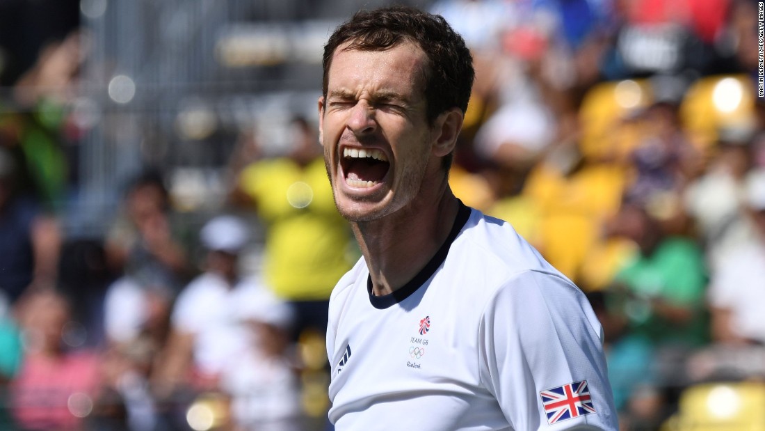 Britain&#39;s Andy Murray celebrates after beating Japan&#39;s Kei Nishikori during their singles semifinal tennis match.