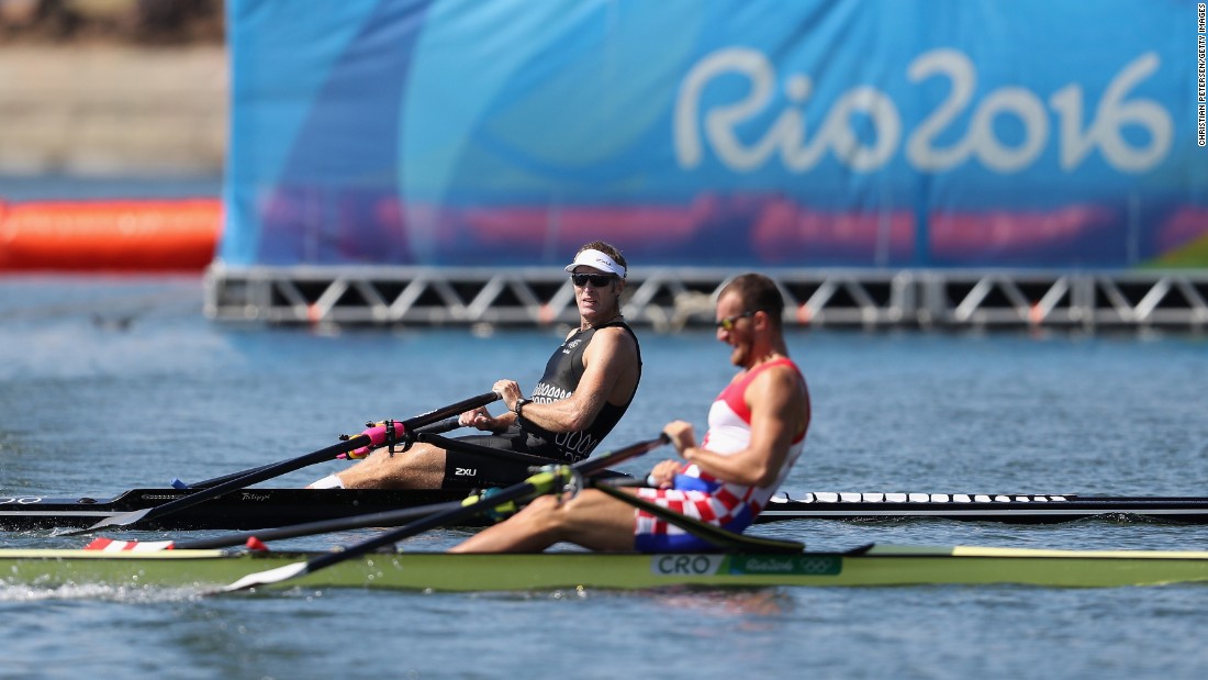 Mahe Drysdale of New Zealand, left, and Damir Martin of Croatia compete in the men&#39;s single sculls final. It was a photo finish -- both rowers clocked in with a time of 6 minutes 41.34 seconds -- but defending champion Drysdale was awarded the gold.
