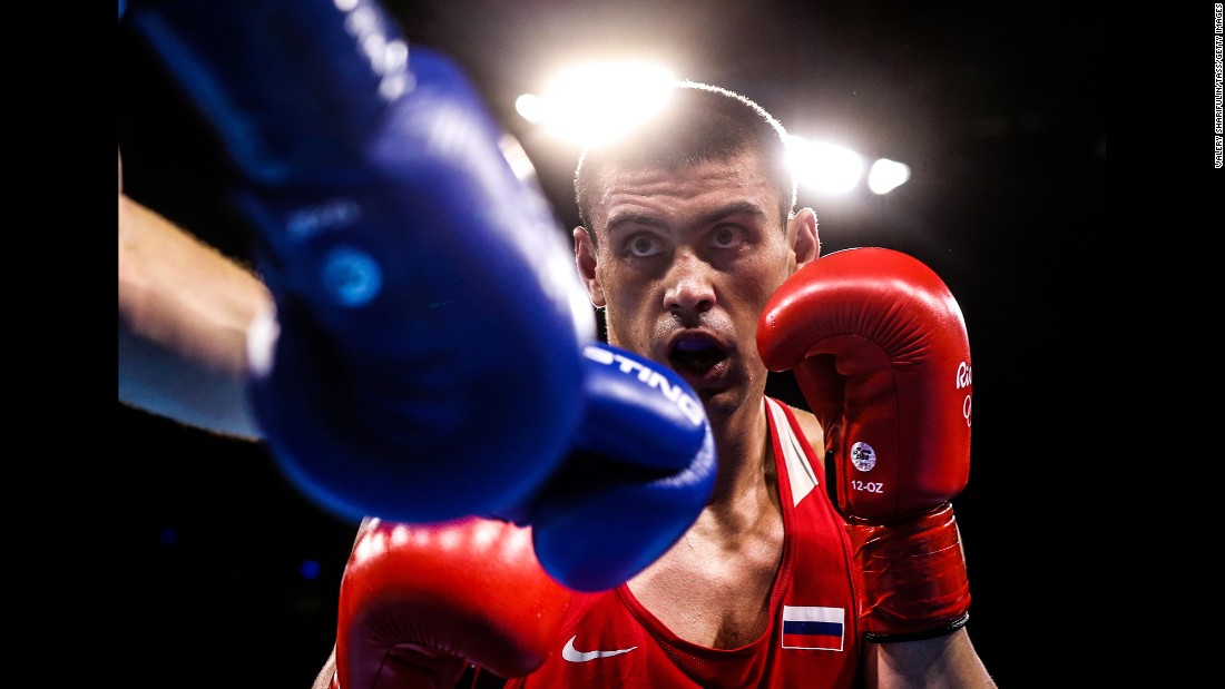 Russian boxer Evgeny Tishchenko won his heavyweight 91-kilogram (201-pound) semifinal bout against Uzbekistan&#39;s Rustam Tulaganov and will go for gold on Monday.