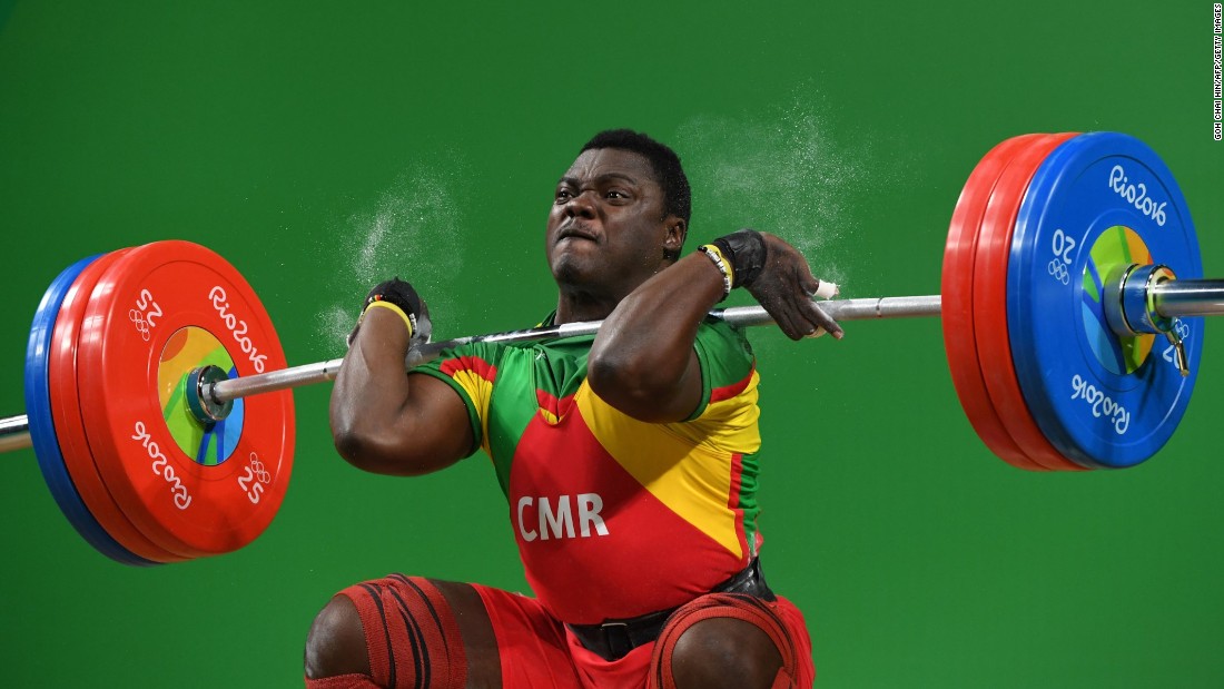 Weightlifter Petit David Minkoumba of Cameroon competes in the the 94-kilogram (207-pound) event.