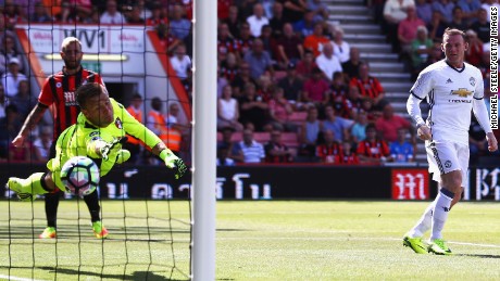 Wayne Rooney  (right) scored his team&#39;s second goal with a cleaver header which evaded the Bournemouth goalkeeper. 