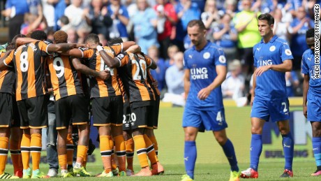 Leicester City&#39;s dejected players traipse off after the champions suffered a shock 2-1 opening day defeat at promoted Hull City. 