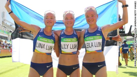 Liina Luik, Lily Luik, and Leila Luik of Estonia pose after the Women&#39;s Marathon