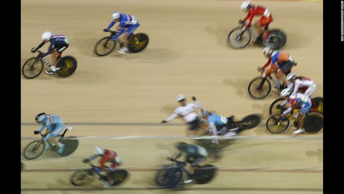 Canada&#39;s Allison Beveridge and Germany&#39;s Anna Knauer fall during the scratch race portion of the omnium track cycling event.