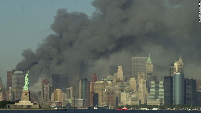 Thick smoke rises over the New York City skyline after the World Trade Center towers were downed by terrorists on September 11, 2001. Nineteen men hijacked four passenger planes that day in an attack orchestrated by al Qaeda leader Osama bin Laden. Two of the planes were intentionally crashed into the two World Trade Center towers. Another crashed into the Pentagon. The fourth crashed in a field near Shanksville, Pennsylvania. Nearly 3,000 people were killed.