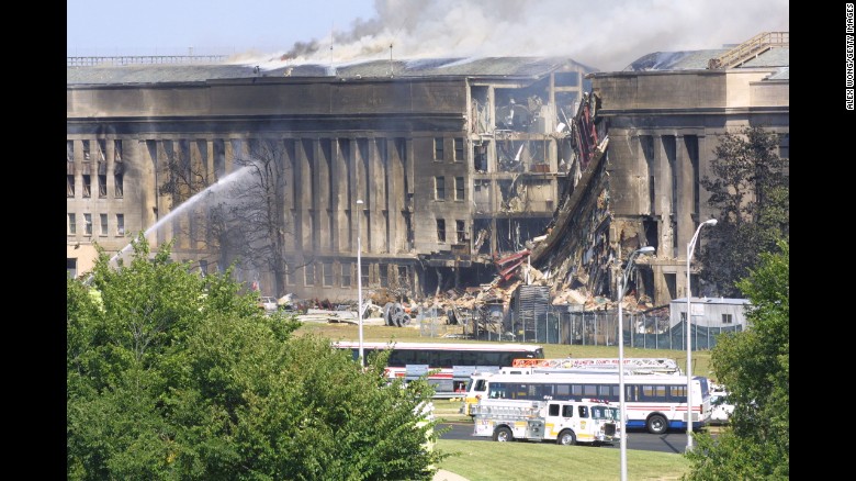 Firefighters try to control the flames at the Pentagon.