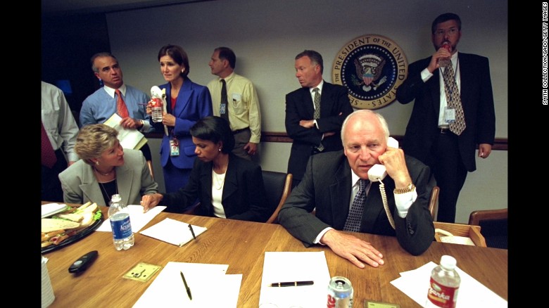 U.S. Vice President Dick Cheney talks on the phone from inside the President&#39;s Emergency Operations Center.