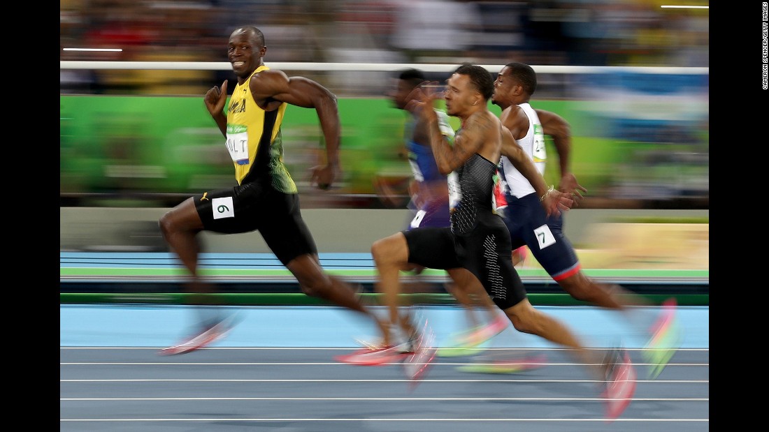 Jamaican sprinter Usain Bolt looks back at his competitors during a 100-meter semifinal on Sunday, August 14. Bolt &lt;a href=&quot;http://www.cnn.com/2016/08/14/sport/usain-bolt-justin-gatlin-olympic-games-100-meters-rio/&quot; target=&quot;_blank&quot;&gt;won the final&lt;/a&gt; a short time later, becoming the first man in history to win the 100 meters at three straight Olympic Games.