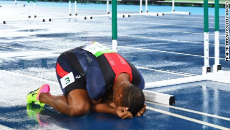 France&#39;s Wilhem Belocian falls to the ground after a false start in the Men&#39;s 110m Hurdles Round 1.