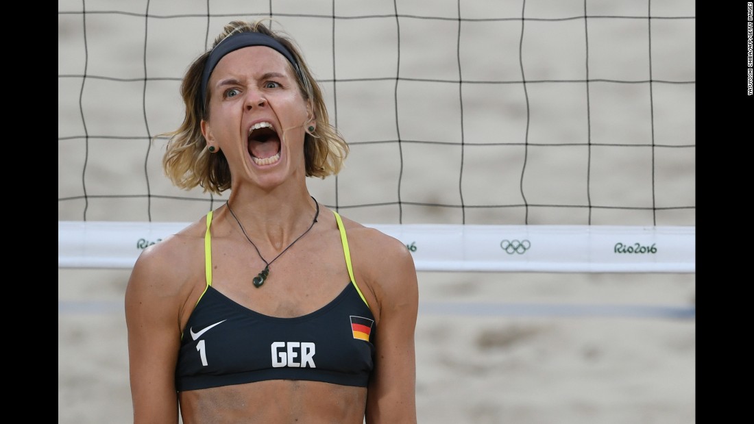 Germany&#39;s Laura Ludwig reacts during a semifinal win in beach volleyball.