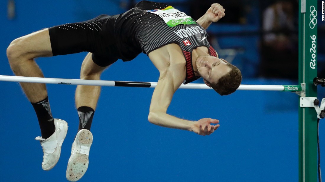 Canada&#39;s Derek Drouin clears the bar on his way to winning gold in the high jump on Tuesday, August 16.