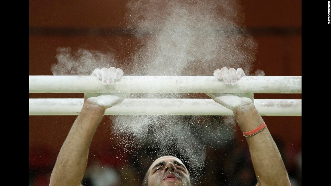 U.S. gymnast Danell Leyva prepares for his performance on the parallel bars during the exhibition gala. Leyva won silver on the apparatus on Tuesday.