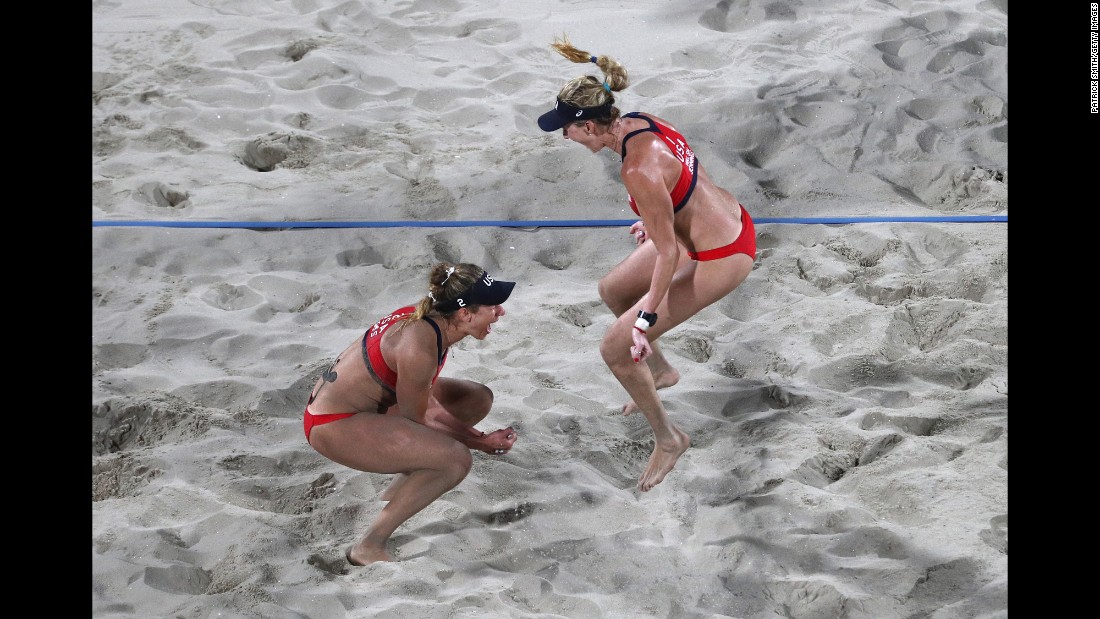U.S. beach volleyball players April Ross, left, and Kerri Walsh Jennings celebrate their bronze-medal win over Brazil&#39;s Larissa Franca and Talita Antunes.