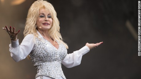 GLASTONBURY, ENGLAND - JUNE 29: Dolly Parton performs on the Pyramid Stage during Day 3 of the Glastonbury Festival at Worthy Farm on June 29, 2014 in Glastonbury, England.  (Photo by Ian Gavan/Getty Images)