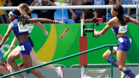 English Gardner and Allyson Felix, right, from the United States, drop the baton in the women&#39;s 4x100-meter relay heat. 
