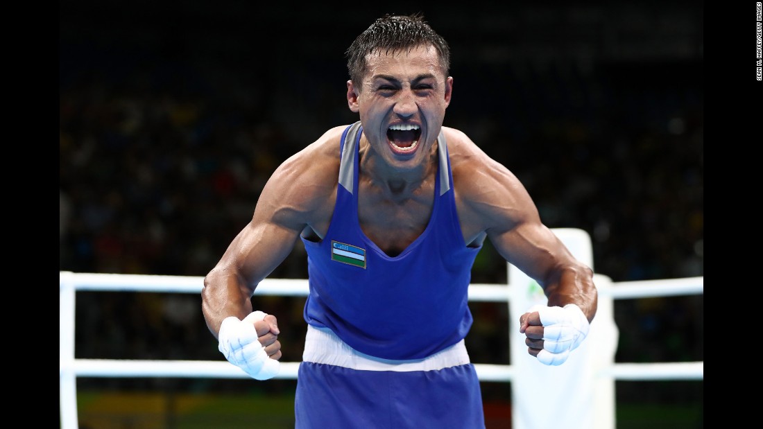 Fazliddin Gaibnazarov, a boxer from Uzbekistan, reacts after he defeated Russia&#39;s Vitaly Dunaytsev in the light-welterweight semifinal.