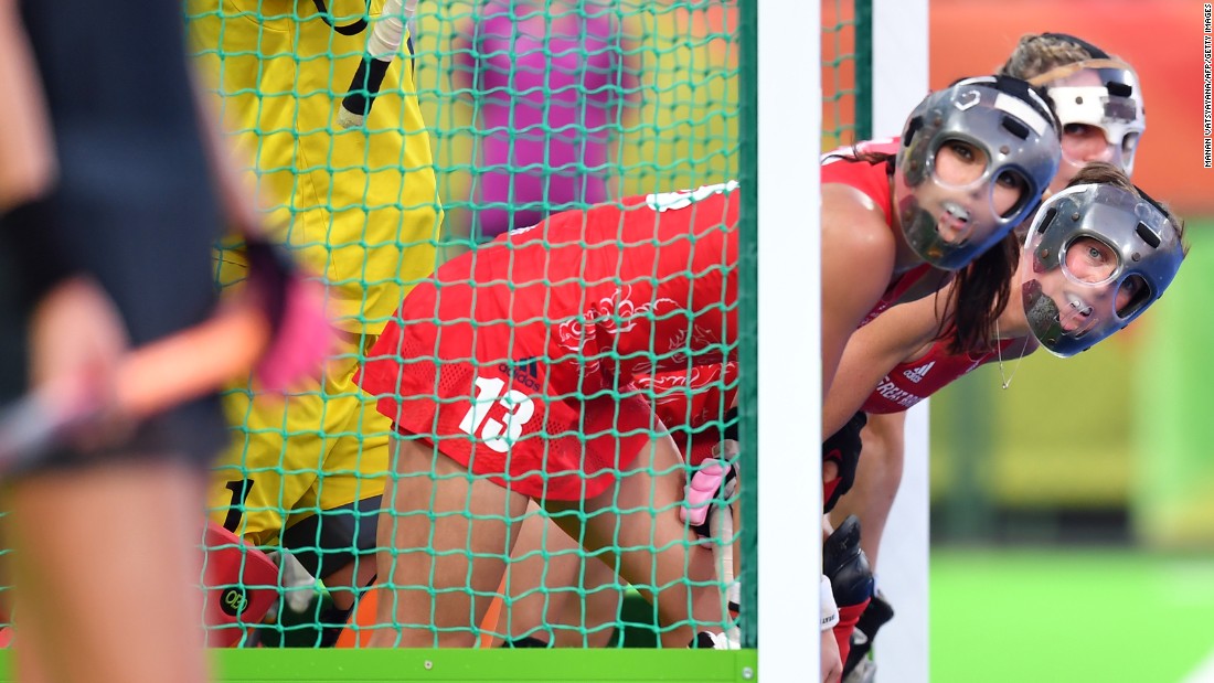 British field hockey players defend their goal during the gold-medal match against the Netherlands. Great Britain won in a shootout.