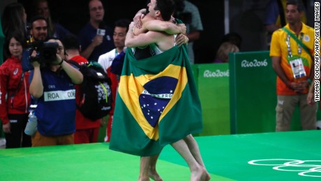 Brazil&#39;s Arthur Mariano (L) and Diego Hypolito celebrate in style