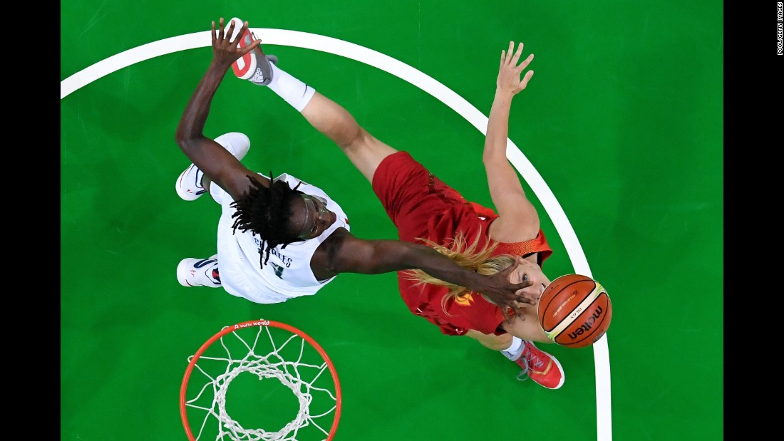 U.S. basketball player Tina Charles, left, and Spain&#39;s Laura Gil battle for the ball in the final game on Saturday, August 20. The Americans earned yet another gold, making it their &lt;a href=&quot;http://www.cnn.com/2016/08/20/sport/rio-olympics-womens-basketball-usa-spain-final/&quot; target=&quot;_blank&quot;&gt;sixth straight Olympic win&lt;/a&gt;.