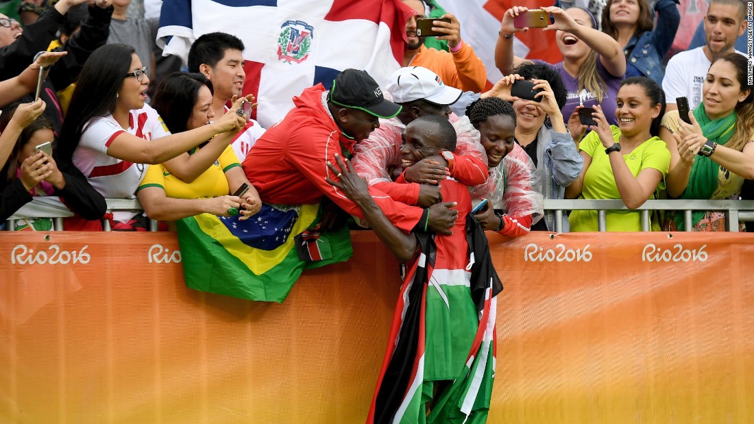 Eliud Kipchoge of Kenya celebrates after earning gold in the marathon.