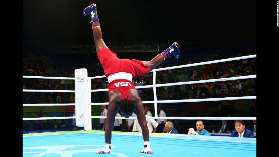 Claressa Shields of the United States celebrates her victory over the Netherlands&#39; Nouchka Fontijn in the middleweight 75-kilogram (165-pound) final boxing bout. Shields is the first U.S. boxer to win back-to-back Olympic gold medals.