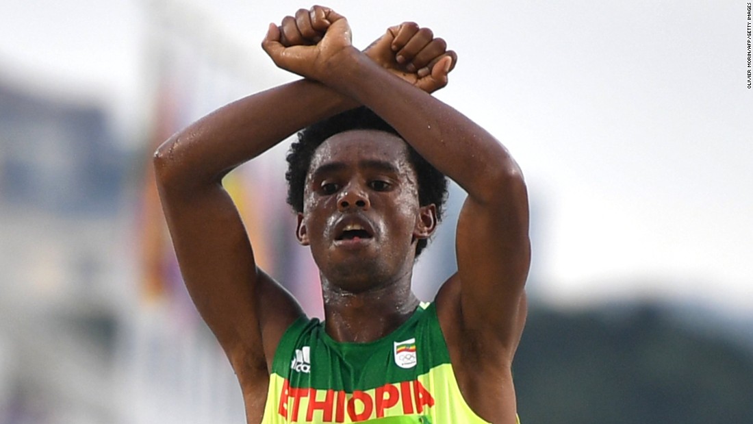 Ethiopia&#39;s Feyisa Lilesa crosses his wrists above his head as he finishes the marathon. Lilesa earned silver in the race and &lt;a href=&quot;http://www.latimes.com/sports/olympics/la-sp-oly-rio-2016-silver-medalist-feyisa-lilesa-shows-1471800285-htmlstory.html&quot; target=&quot;_blank&quot;&gt;said his gesture&lt;/a&gt; was in solidarity with &lt;a href=&quot;http://www.cnn.com/2016/08/09/africa/ethiopia-oromo-protest/index.html&quot; target=&quot;_blank&quot;&gt;the protesters in his home country&lt;/a&gt;, who have been staging a resistance movement against the Ethiopian government.