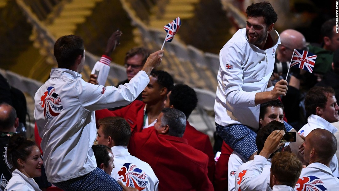Team Great Britain celebrates during the &quot;Heroes of the Games&quot; segment.