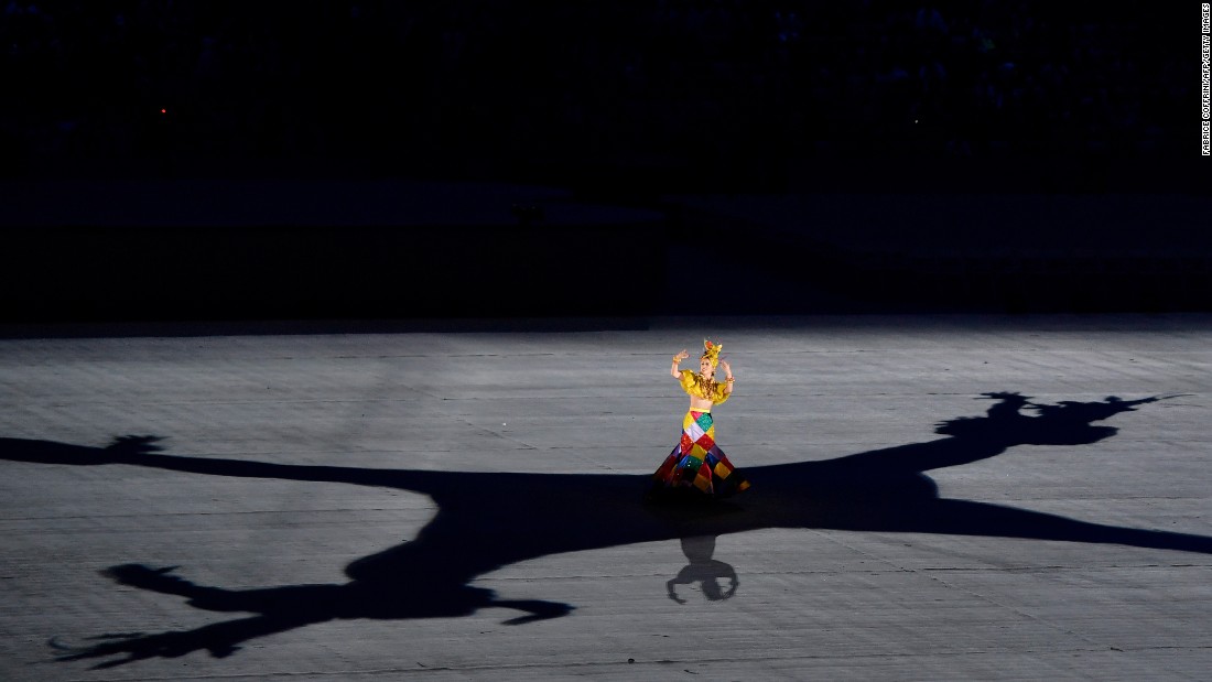 A dancer performs during the closing ceremony.