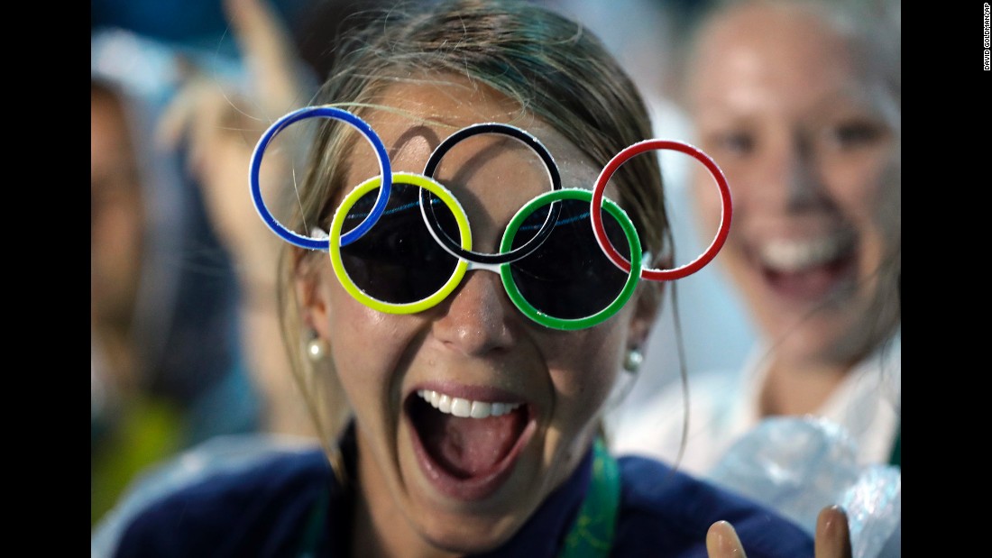 Jackie Briggs from the United States wears Olympic ring sunglasses.