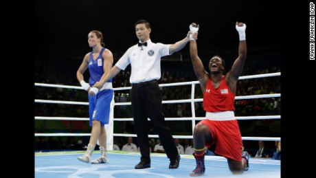 Claressa Maria Shields, right, reacts as she won her gold medal for the women&#39;s middleweight 75-kg boxing.