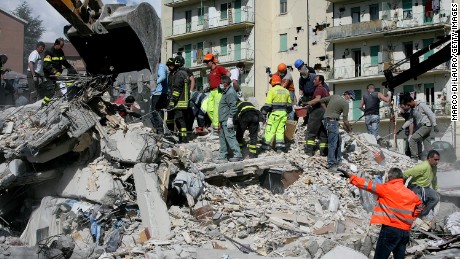 Rescue workers searched for bodies in the rubble of a destroyed building in L&#39;Aquila, Italy, after a 6.3-magnitude earthquake tore through the region in April 2009. 