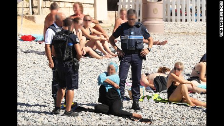 Police patrolling the promenade des anglais beach in Nice fined a woman for wearing a burkini.