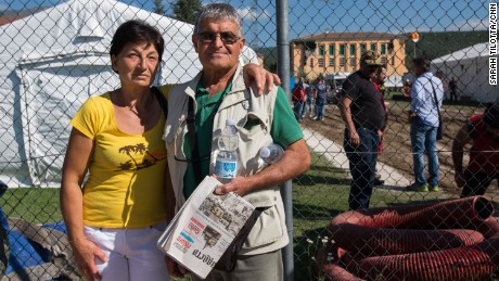 Marisa Di Tommaso and husband Michelo Giuseppe pose together near the makeshift headquarters of the Italian Red Cross in Amatrice. 