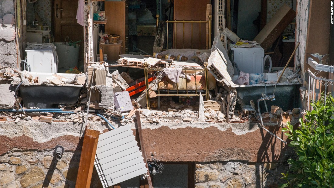 The destroyed interior of a home is seen in Amatrice.