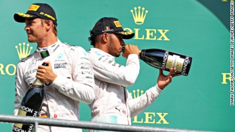 Nico Rosberg (left) and Lewis Hamilton celebrate on the podium after the Belgian Grand Prix.