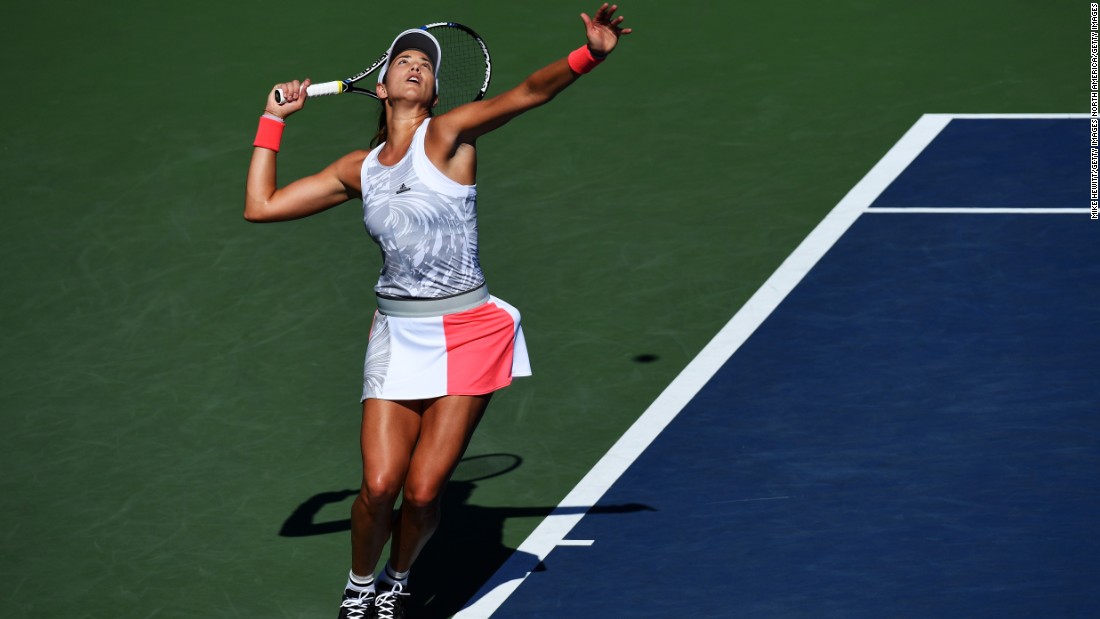 Muguruza, conqueror of Serena Williams in June&#39;s French Open, admitted she had trouble breathing after losing the first set 6-2. But, with Mertens competing in the main draw at Flushing Meadows for the first time, Muguruza recovered her poise to take the remaining two sets 6-0 6-3. 