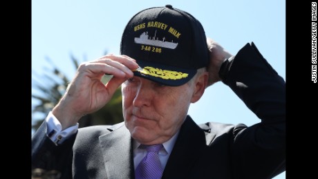 Former Navy Secretary Ray Mabus puts on a hat for the new USNS Harvey Milk during a  ceremony on August 16, 2016.