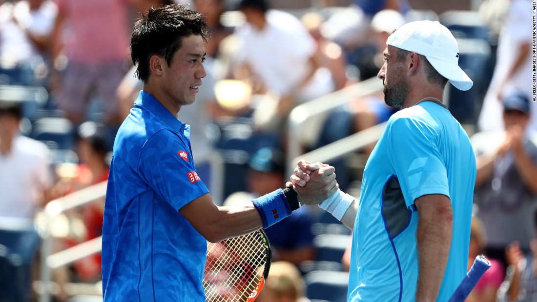 Japan&#39;s Kei Nishikori, seeded sixth, shakes hands with Benjamin Becker after beating the German 6-1 6-1 3-6 6-3 on Tuesday. 
