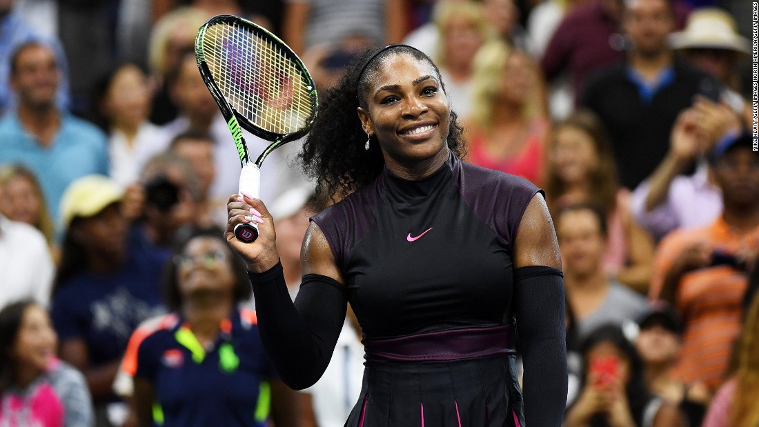 Serena Williams is all smiles after she beat Russia&#39;s Ekaterina Makarova 6-3 6-3 in their first round match. Williams is bidding for a record 23rd grand slam singles title.