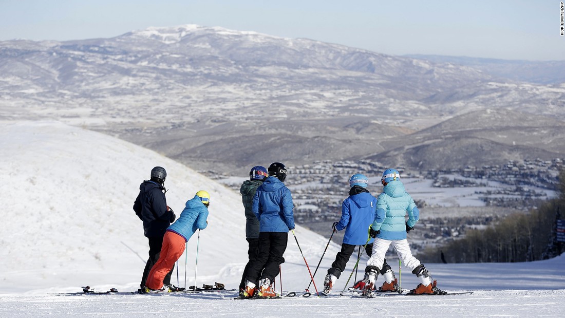 Winter or summer, Park City is the center of a booming tourism industry. In the warmer months, there&#39;s biking and hiking. When snow falls, skiers like this group head to Park City Mountain Resort.