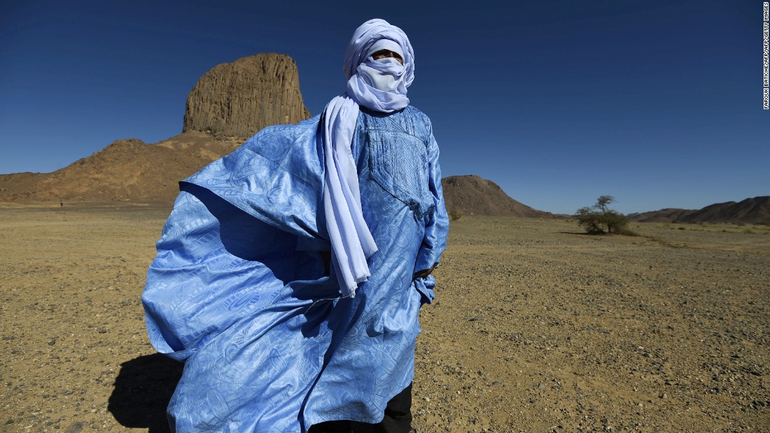 Tuaregs are the only tribal communities in which &lt;a href=&quot;http://travel.cnn.com/surviving-sahara-468896/&quot;&gt;men wear veils instead of women&lt;/a&gt;. The tangelmust, a wrapped headdress up to eight meters in length, is ubiquitous among the &quot;blue men of the desert.&quot; The name does not allude to the muslin headdress, dyed with indigo, but rather because the dye gradually leeches out into the skin of the wearer. Tuaregs use the tangelmust for practical reasons: it protects from the sun and sand, but men will still wear them at night, and even during meals. Men cover their faces with the tangelmust in front of strangers and women, while women are free to show their face. 
