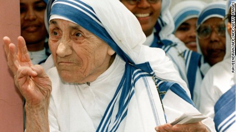 NEW DELHI, INDIA:  (FILES) In this file picture taken, 15 May 1997, Mother Teresa stands with nuns of the Missionaries of Charity For Destitute Children in New Delhi.  Mother Teresa will be beatified, 19 October 2003, in a ceremony in St Peter&#39;s Square, Vatican. The beatification ceremony is the penultimate step to being canonised a saint and has been the shortest in modern history. Following the beatification, a second miracle has to be verified by the Vatican before Mother Teresa can be proclaimed a saint.   AFP PHOTO/RAVEENDRAN  (Photo credit should read RAVEENDRAN/AFP/Getty Images)