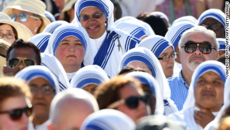 Nuns of the Missionaries of Charity wait in St. Peter&#39;s Square.